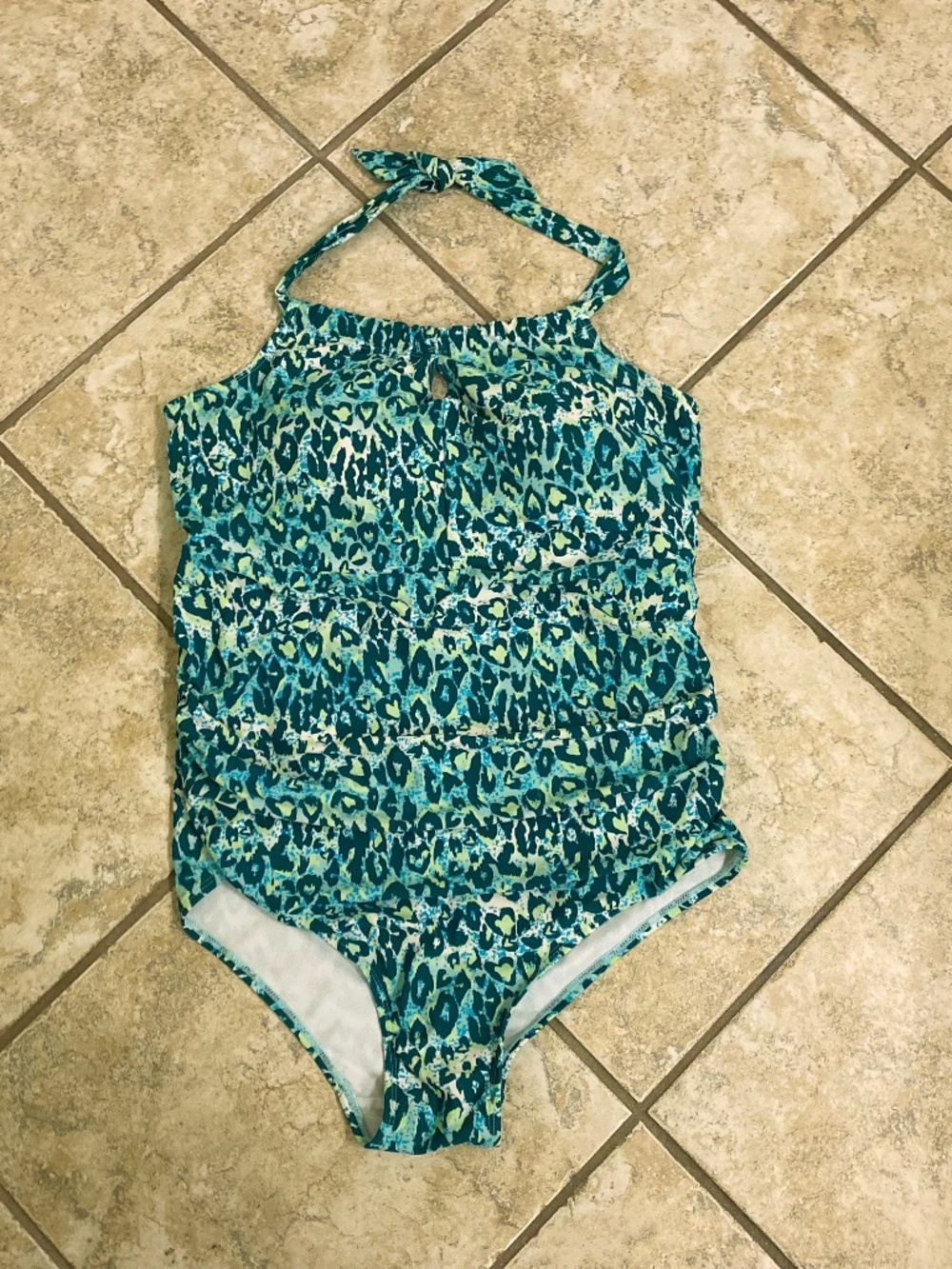 Green animal print halter style one piece swimsuit by Serra size x-large